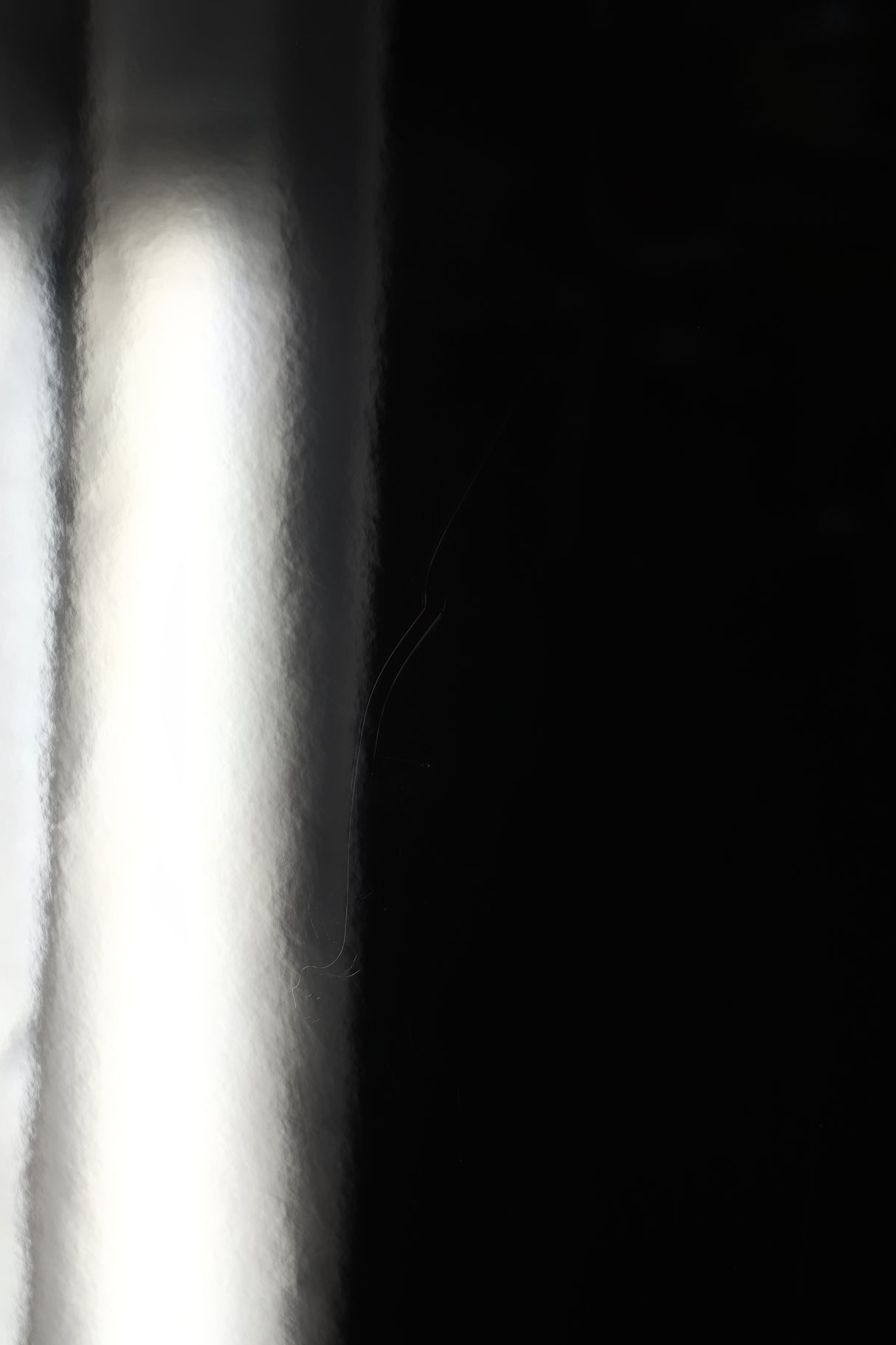Close up view of a used PMC Twenty5 26i Floorstanding Speaker in Diamond Black finish showing some faint scratching on one side