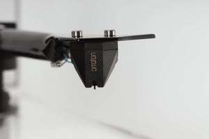 Close up view of a used Pro-Ject 2 Xperience DC Acryl Turntable with Ortofon 2M Black Cartridge