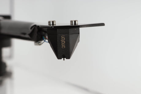 Close up view of a used Pro-Ject 2 Xperience DC Acryl Turntable with Ortofon 2M Black Cartridge