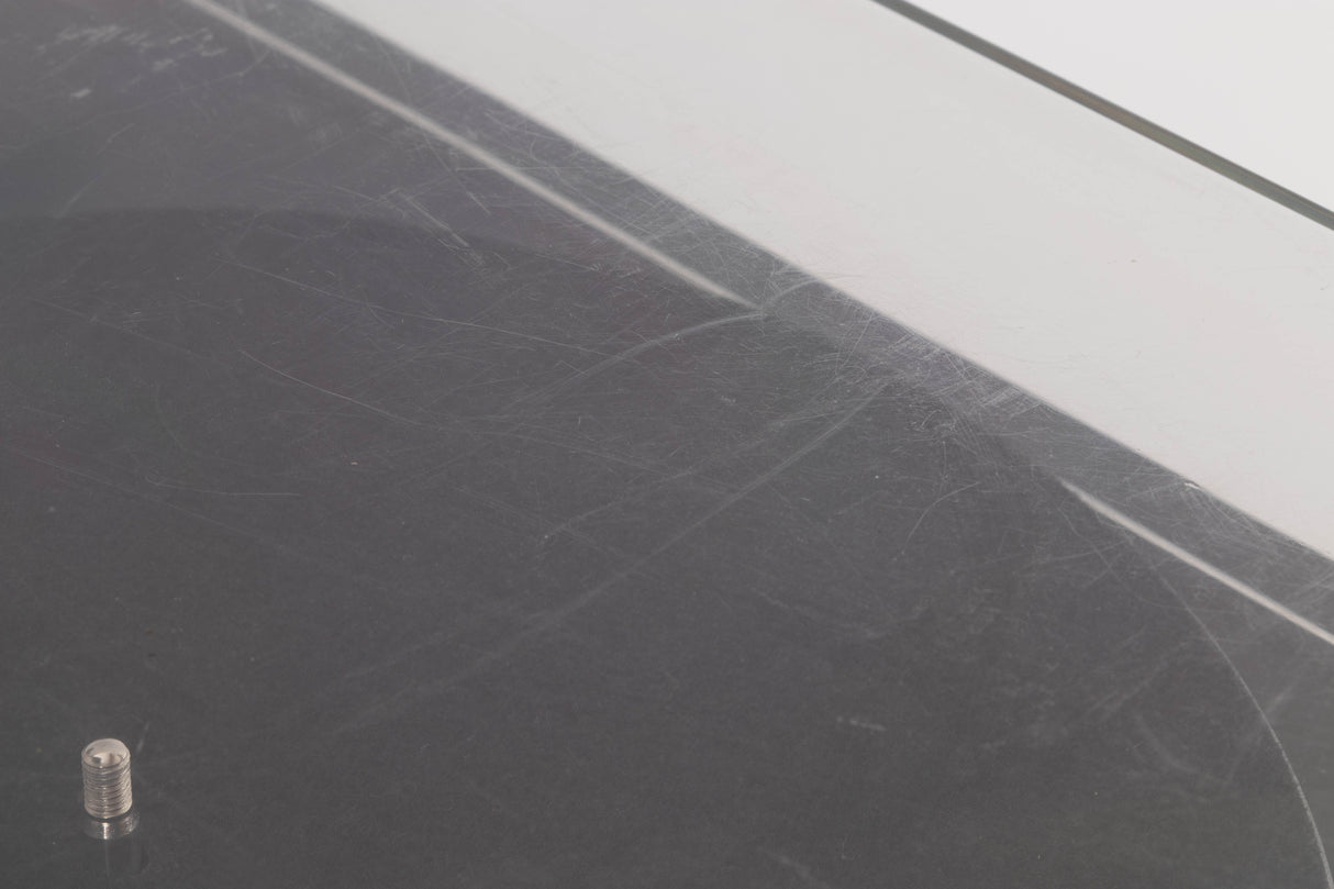 Close up of a used Pro-ject P2 Turntable / Goldring 2 Cartridge in a Black finish showing scratching on top of lid