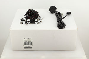Box of a used Pro-Ject Power Box DS Sources Power Supply in Silver finish showing Mains cable, and connecting cables