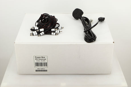 Box of a used Pro-Ject Power Box DS Sources Power Supply in Silver finish showing Mains cable, and connecting cables