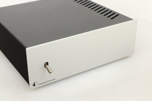 Close up view of a used Pro-Ject Power Box DS Sources Power Supply in Silver finish