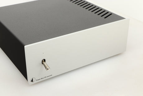Close up view of a used Pro-Ject Power Box DS Sources Power Supply in Silver finish