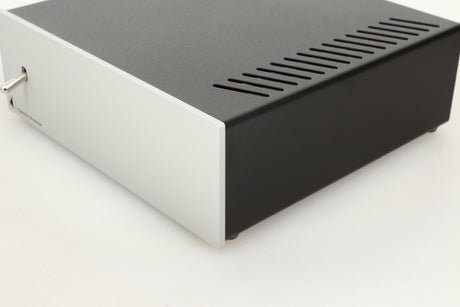 Front right corner view of a used Pro-Ject Power Box DS Sources Power Supply in Silver finish