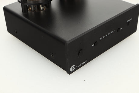 Front left corner view of a used Pro-Ject Tube Box E Phonostage in Black finish