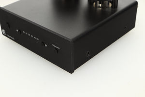 Front right corner view of a used Pro-Ject Tube Box E Phonostage in Black finish