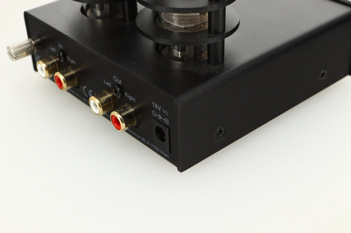 Rear right corner view of a used Pro-Ject Tube Box E Phonostage in Black finish