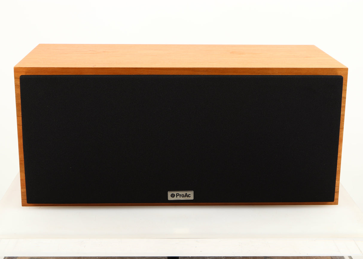 Front view of a used ProAc Centre Voice Speaker in a cherry finish showing Grille