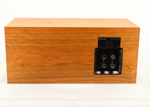 Rear view of a used ProAc Centre Voice Speaker in a cherry finish