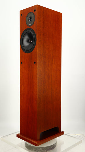 Front right corner of a used Proac Response D18 Floorstanding Speaker in a mahogany finish