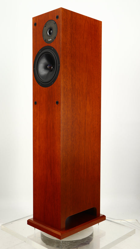 Front right corner of a used Proac Response D18 Floorstanding Speaker in a mahogany finish