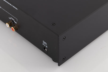 Rear left corner of a used Project CD Box DS3 CD Player in a Black finish