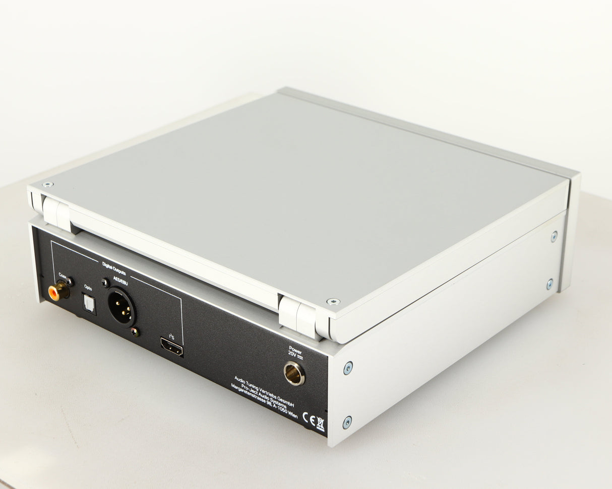 Rear left corner of a used Project CD Box RS2 T CD Transport in a silver finish