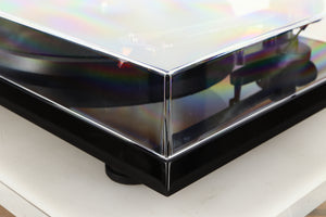 Front right corner of a used Project Debut Carbon Evo DC Turntable in a black finish