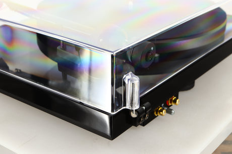 Rear right corner of a used Project Debut Carbon Evo DC Turntable in a black finish