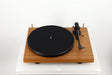 Front view of a used Project Debut Carbon Evo Turntable / Ortofon 2M Bronze Cartridge in a walnut finish