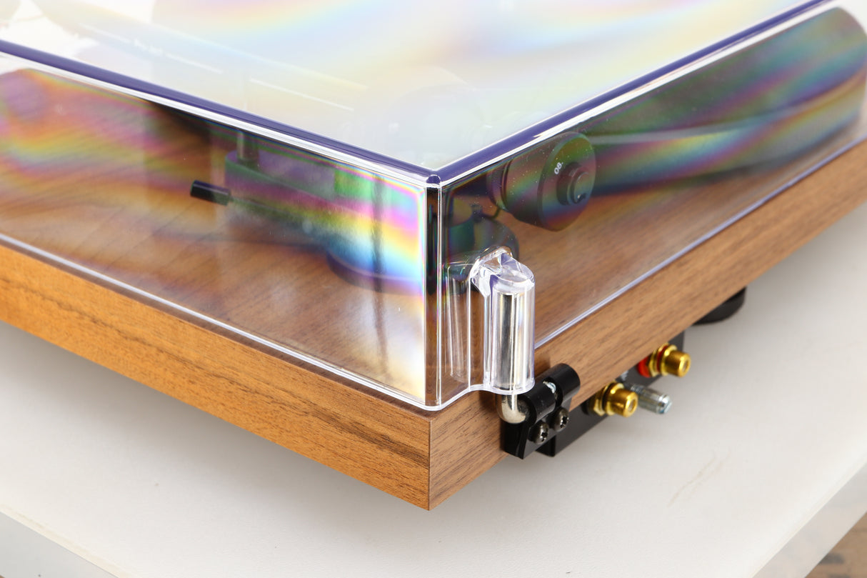 Rear right corner of a used Project Debut Carbon Evo Turntable / Ortofon 2M Bronze Cartridge in a walnut finish