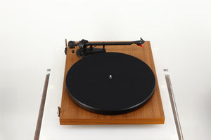 Left side view of a used Project Debut Carbon Evo Turntable / Ortofon 2M Bronze Cartridge in a walnut finish