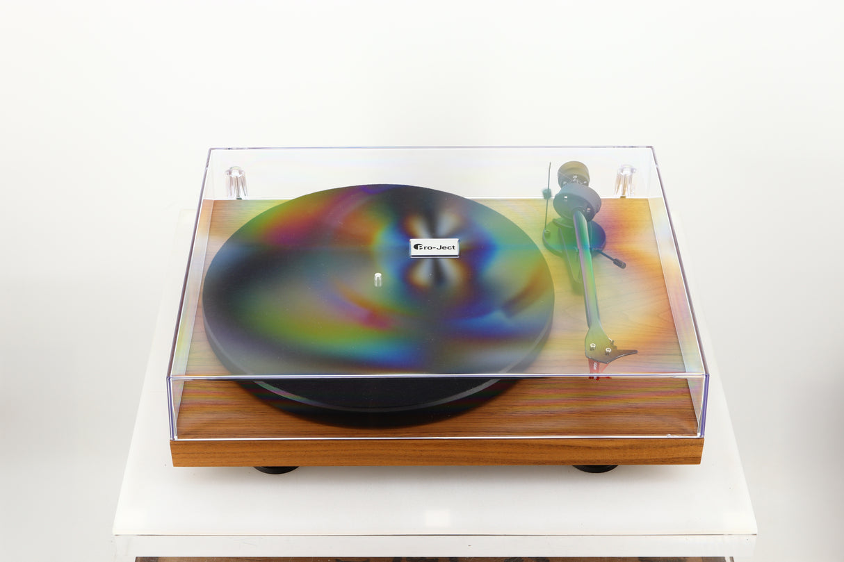 Top of a used Project Debut Carbon Evo Turntable / Ortofon 2M Bronze Cartridge in a walnut finish