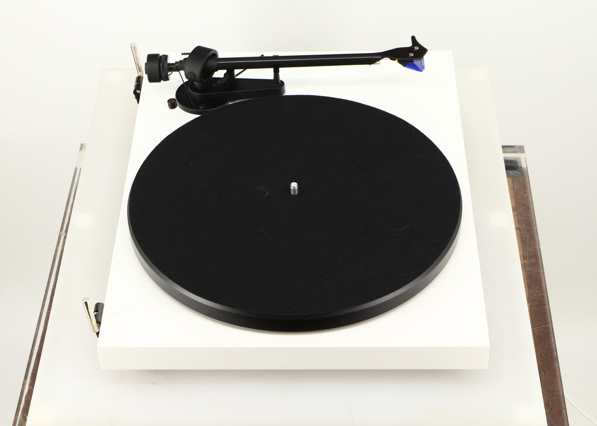 Left side view of a used Project Debut Carbon Turntable / Ortofon 2M Blue Cartridge in a white finish