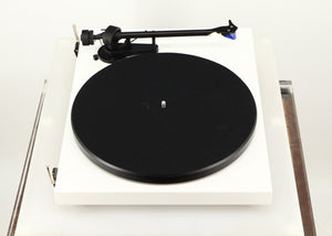 Left side view of a used Project Debut Carbon Turntable / Ortofon 2M Blue Cartridge in a white finish