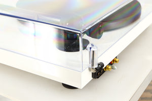 Rear right corner of a used Project Debut Carbon Turntable / Ortofon 2M Blue Cartridge in a white finish