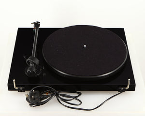 Rear view of a used Project Debut Carbon Turntable in a piano black finish