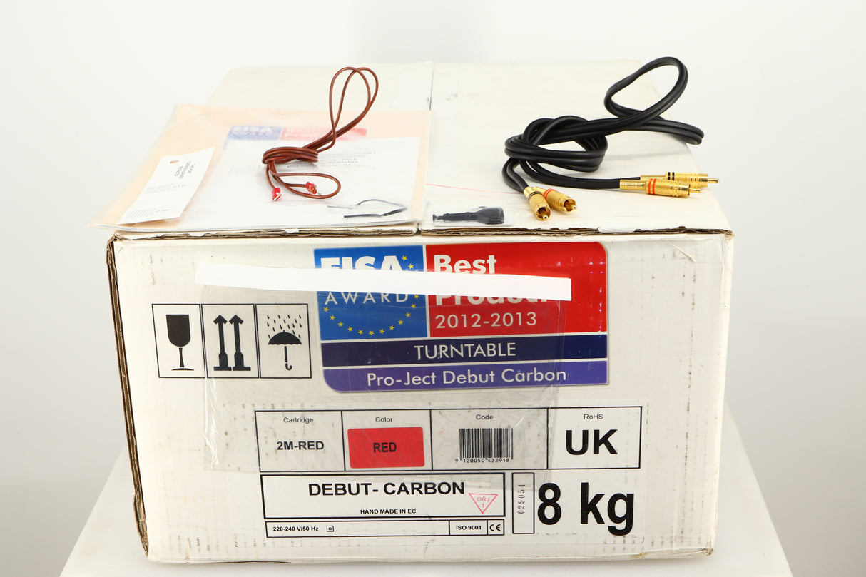 Box for a used Project Debut Carbon Turntable in a red finish showing