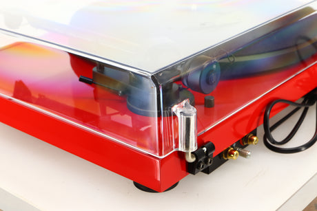 Rear right corner of a used Project Debut Carbon Turntable in a red finish