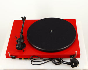 Front view of a used Project Debut Carbon Turntable in a red finish