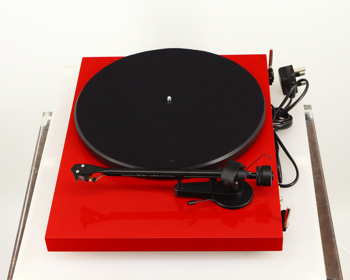 Right side view of a used Project Debut Carbon Turntable in a red finish