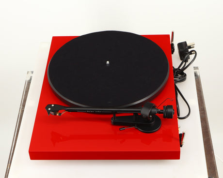 Right side view of a used Project Debut Carbon Turntable in a red finish