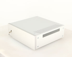 Front right corner of a used Project Power Box RS Uni-1-Way Power Supply in a silver finish