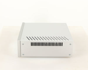 Right side view of a used Project Power Box RS Uni-1-Way Power Supply in a silver finish