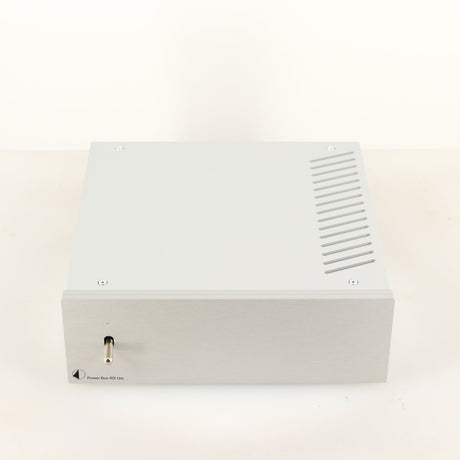 Top of a used Project Power Box RS Uni-1-Way Power Supply in a silver finish