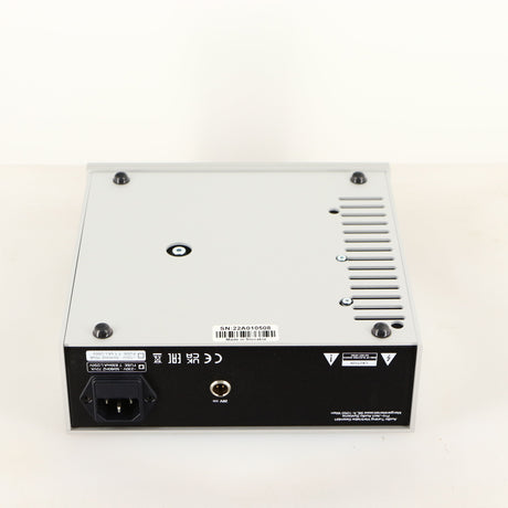 Underside of a used Project Power Box RS Uni-1-Way Power Supply in a silver finish