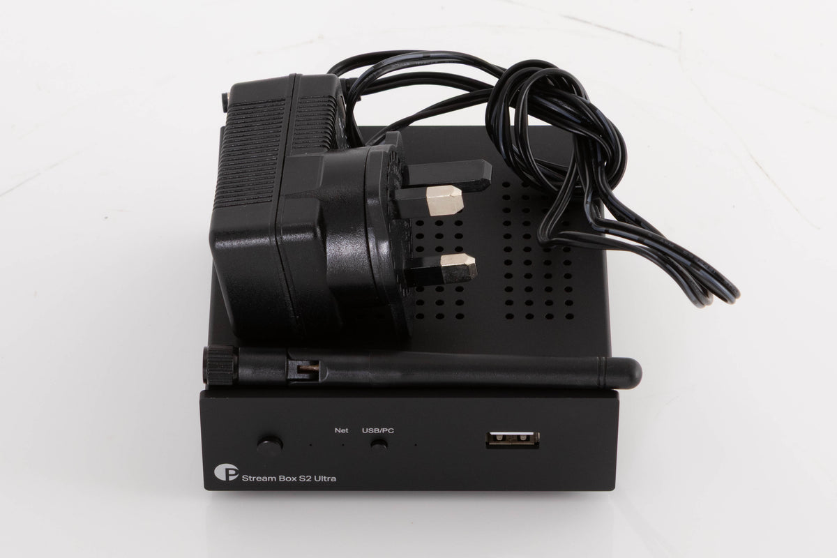 Top of a used Project Streambox S2 Ultra Network Streamer in a Black finish showing PSU and Wi-Fi Aerial