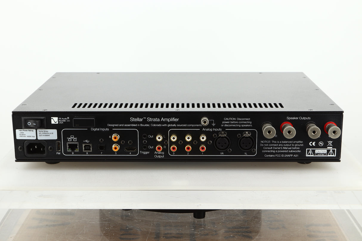 Rear view of a used PS Audio Stellar Strata Mk1 Integrated Amplifier in black finish showing ethernet, USB, optical, HDMI, and mains inputs, RCA XLR and speaker outputs
