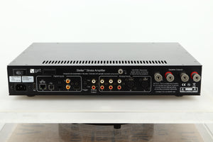 Rear view of a used PS Audio Stellar Strata Mk1 Integrated Amplifier in black finish showing ethernet, USB, optical, HDMI, and mains inputs, RCA XLR and speaker outputs