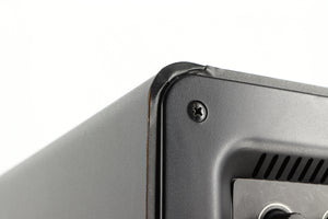 Close up of a used Q Acoustics 2070si Subwoofer in a black finish showing blemish on rear right corner