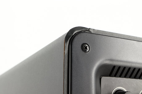 Close up of a used Q Acoustics 2070si Subwoofer in a black finish showing blemish on rear right corner