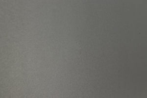 Close up of a used Q Acoustics 2070si Subwoofer in a black finish showing mark on left side