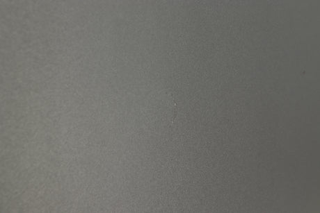 Close up of a used Q Acoustics 2070si Subwoofer in a black finish showing mark on left side