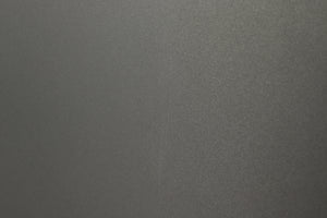 Close up of a used Q Acoustics 2070si Subwoofer in a black finish showing scratch on right side