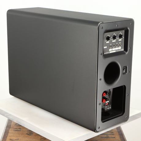 Rear right corner of a used Q Acoustics 2070si Subwoofer in a black finish