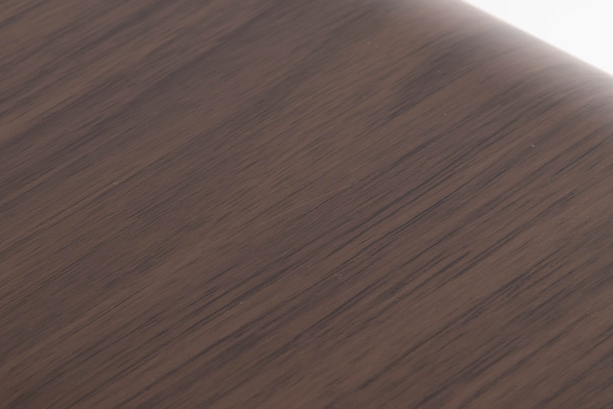 Close up of a used Q Acoustics 3070S Subwoofer in a American Walnut finish showing scratch on top