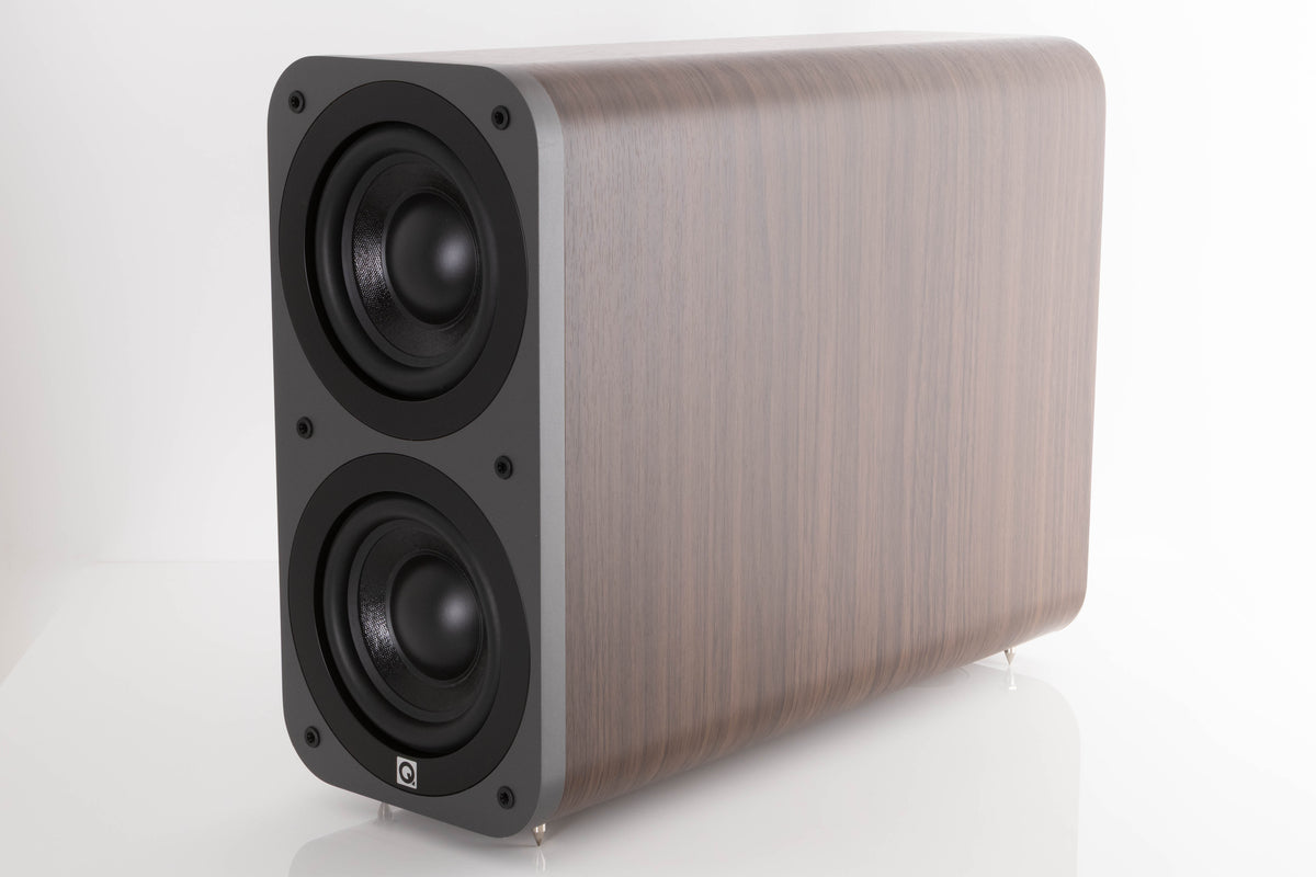 Front right corner of a used Q Acoustics 3070S Subwoofer in a American Walnut finish