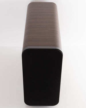 Top of a used Q Acoustics 3070S Subwoofer in a American Walnut finish