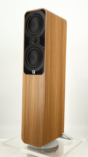 Front right corner of a used Q Acoustics 5050 Floorstanding Speaker in an oak finish